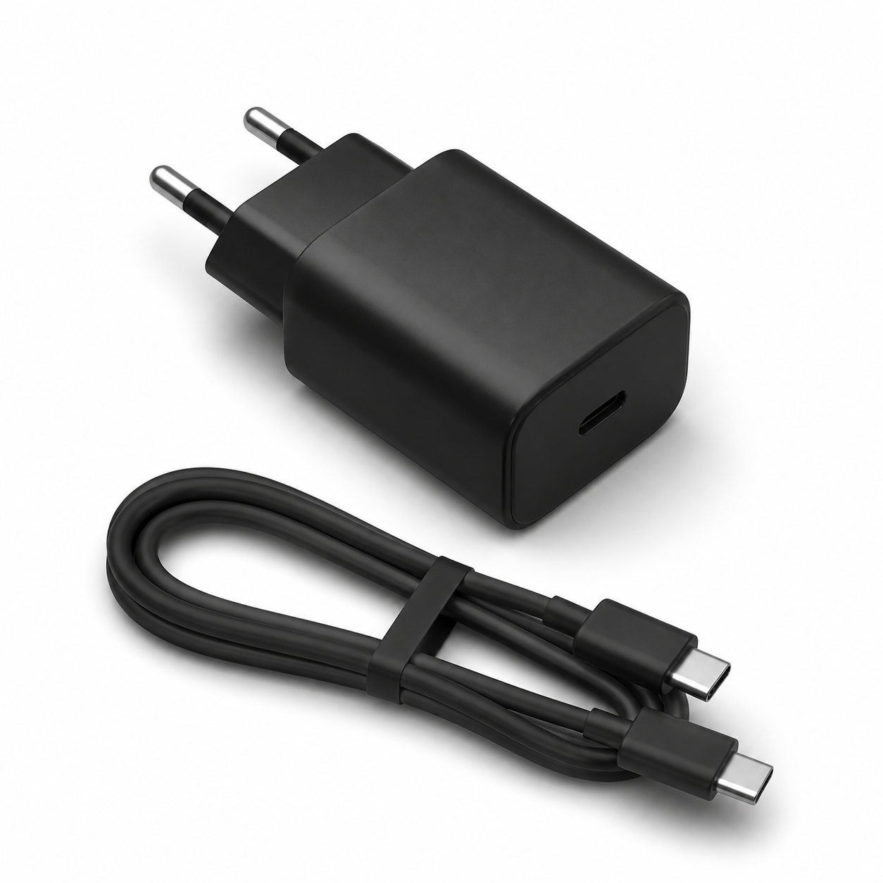 Cargador rápido negro de 30 W con cable USB-C sobre fondo blanco